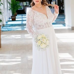 Wedding dress. Wore for 2 hours only.